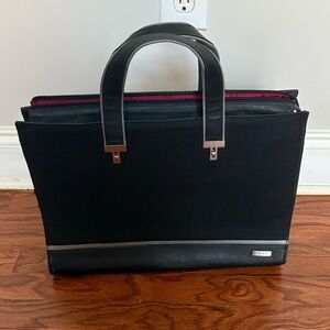 TUMI Crimson Travel Bag